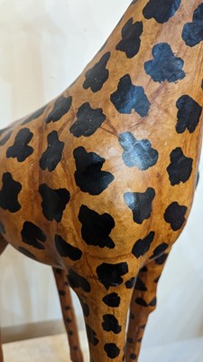 Lot 138 - A pair of painted hide figures of giraffes
