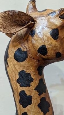 Lot 138 - A pair of painted hide figures of giraffes