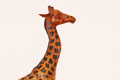 Lot 138 - A pair of painted hide figures of giraffes