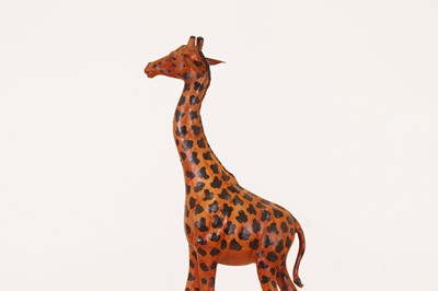 Lot 138 - A pair of painted hide figures of giraffes