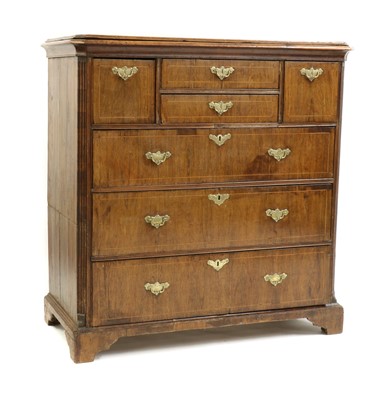 Lot 480 - A walnut and pine chest of drawers