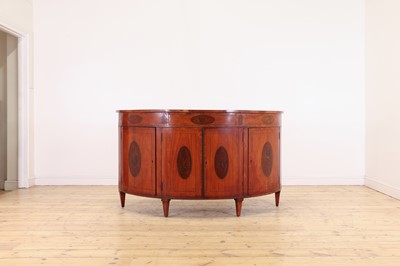 Lot 512 - A George III-style satinwood side cabinet in the style of Mayhew and Ince