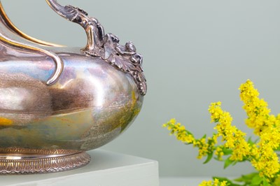 Lot 125 - A Victorian silver and silver-gilt askos jug