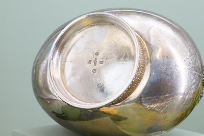Lot 125 - A Victorian silver and silver-gilt askos jug