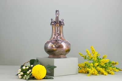 Lot 125 - A Victorian silver and silver-gilt askos jug