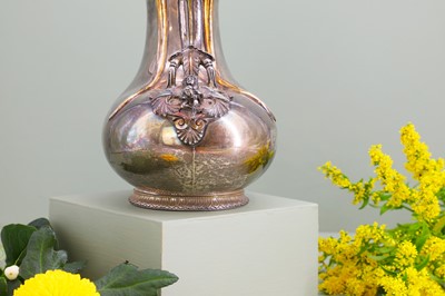 Lot 125 - A Victorian silver and silver-gilt askos jug