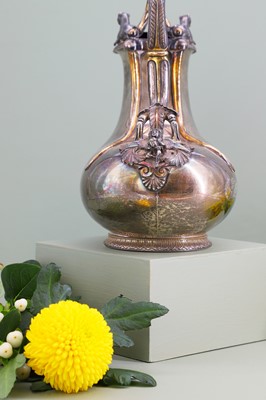 Lot 125 - A Victorian silver and silver-gilt askos jug