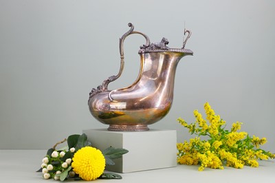 Lot 125 - A Victorian silver and silver-gilt askos jug