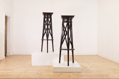 Lot 362 - A pair of ebonised wooden sculpture stands