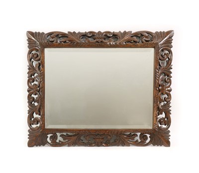 Lot 447 - A Florentine style hardwood wall mirror