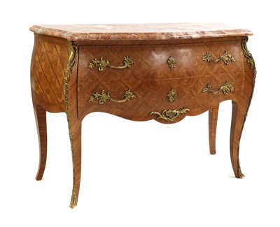 Lot 529 - A Louis XV-style tulipwood and kingwood commode