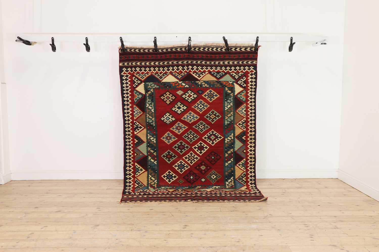 Lot 189 - A Persian Qashqai kilim wool rug