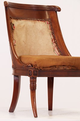 Lot 54 - A pair of Charles X mahogany low chairs