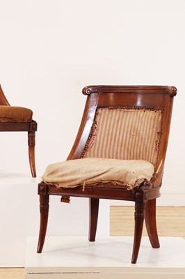 Lot 54 - A pair of Charles X mahogany low chairs