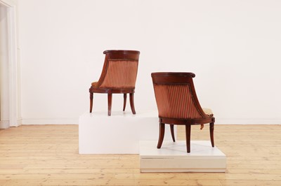 Lot 54 - A pair of Charles X mahogany low chairs