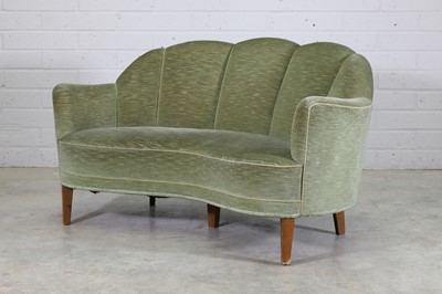 Lot 232 - A Danish Modern banana settee