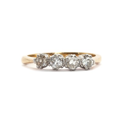 Lot 51 - A four stone diamond ring