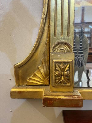 Lot 33 - A George III-style carved giltwood and gesso overmantel mirror