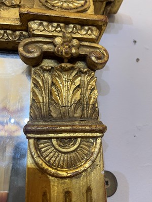 Lot 33 - A George III-style carved giltwood and gesso overmantel mirror