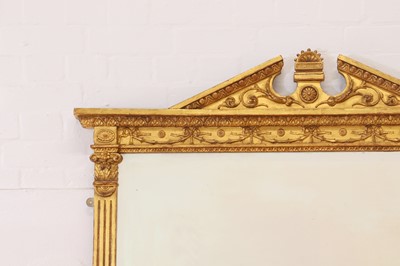 Lot 33 - A George III-style carved giltwood and gesso overmantel mirror