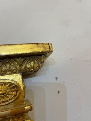 Lot 33 - A George III-style carved giltwood and gesso overmantel mirror