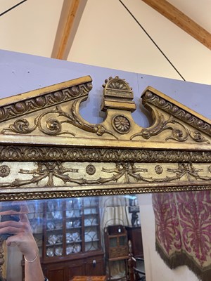 Lot 33 - A George III-style carved giltwood and gesso overmantel mirror
