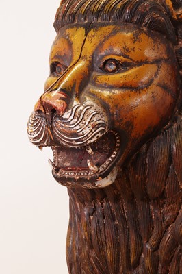 Lot 135 - A large painted pine lion