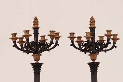 Lot 265 - A pair of large gilt and patinated bronze candelabra