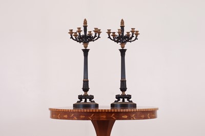 Lot 265 - A pair of large gilt and patinated bronze candelabra