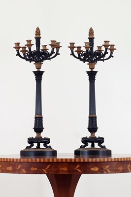 Lot 265 - A pair of large gilt and patinated bronze candelabra