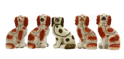 Lot 158 - A group of five Staffordshire pottery dogs