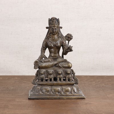 Lot 447 - A Tibetan bronze bodhisattva