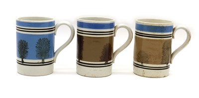 Lot 146 - Three mocha-ware pint mugs