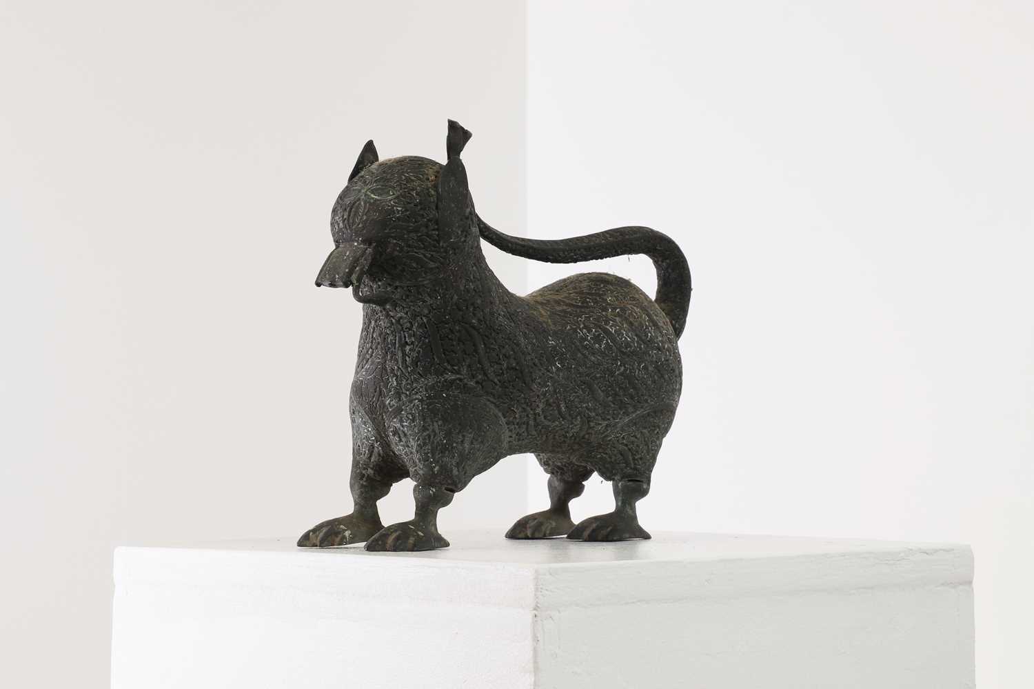 Lot 146 - A copper alloy temple figure