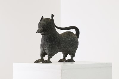 Lot 146 - A copper alloy temple figure