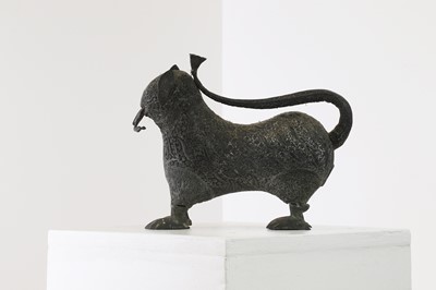 Lot 146 - A copper alloy temple figure