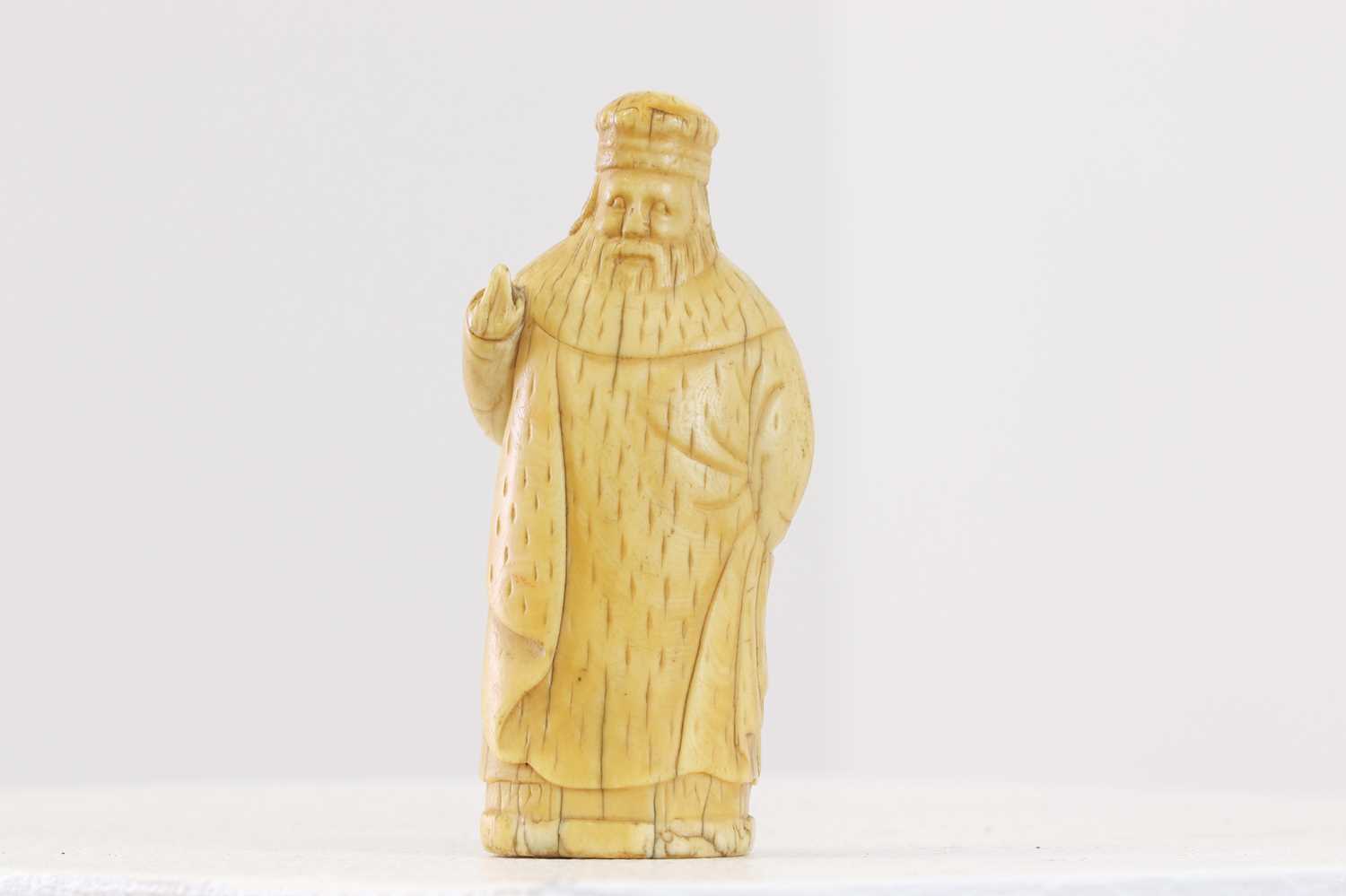 Lot 268 - A marine ivory chess piece or chessman