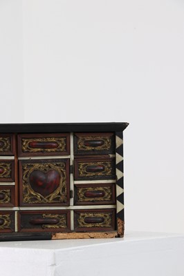 Lot 380 - A bone and tortoiseshell inlaid table cabinet