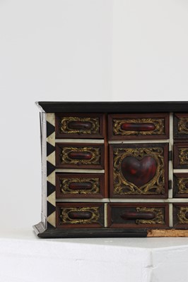 Lot 380 - A bone and tortoiseshell inlaid table cabinet