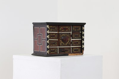 Lot 380 - A bone and tortoiseshell inlaid table cabinet