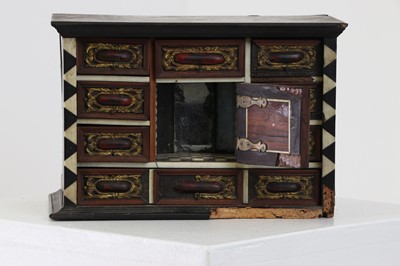 Lot 380 - A bone and tortoiseshell inlaid table cabinet