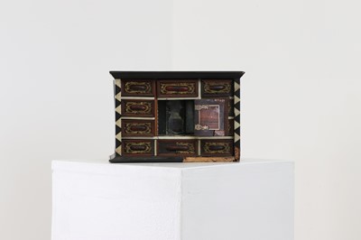 Lot 380 - A bone and tortoiseshell inlaid table cabinet
