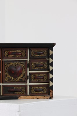 Lot 380 - A bone and tortoiseshell inlaid table cabinet