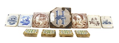 Lot 144 - A group of eleven pottery tiles