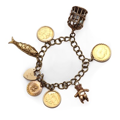 Lot 279 - A 9ct gold charm bracelet with sovereign coins
