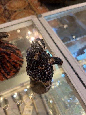 Lot 319 - A pair of papier mâché shell dolls