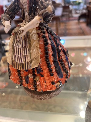 Lot 319 - A pair of papier mâché shell dolls