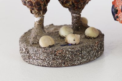 Lot 319 - A pair of papier mâché shell dolls