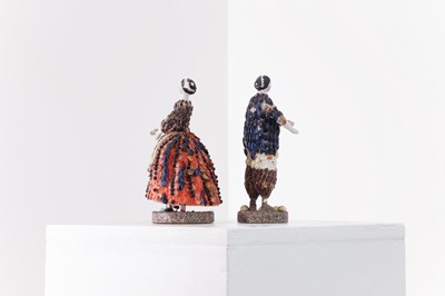 Lot 319 - A pair of papier mâché shell dolls