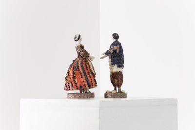 Lot 319 - A pair of papier mâché shell dolls